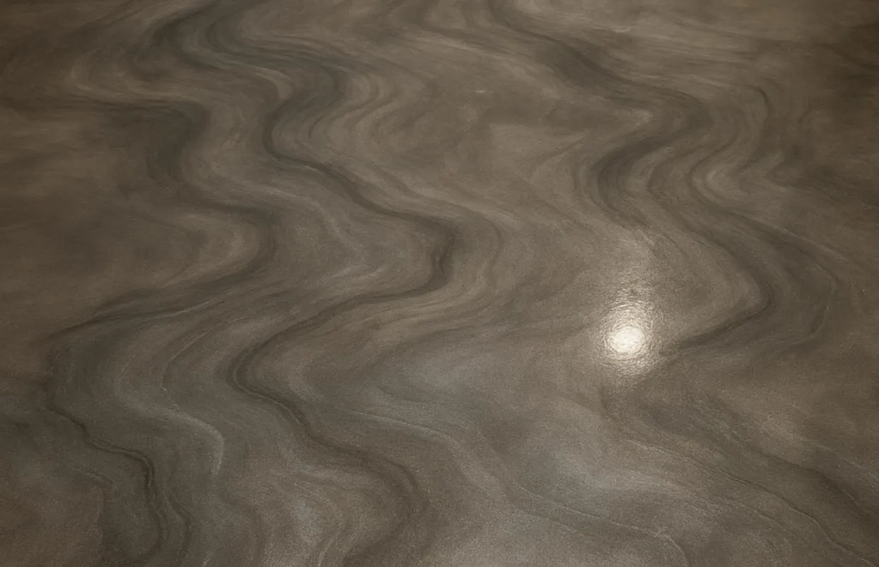 Bronze IFS metallic epoxy floor with a wave pattern and a glossy finish