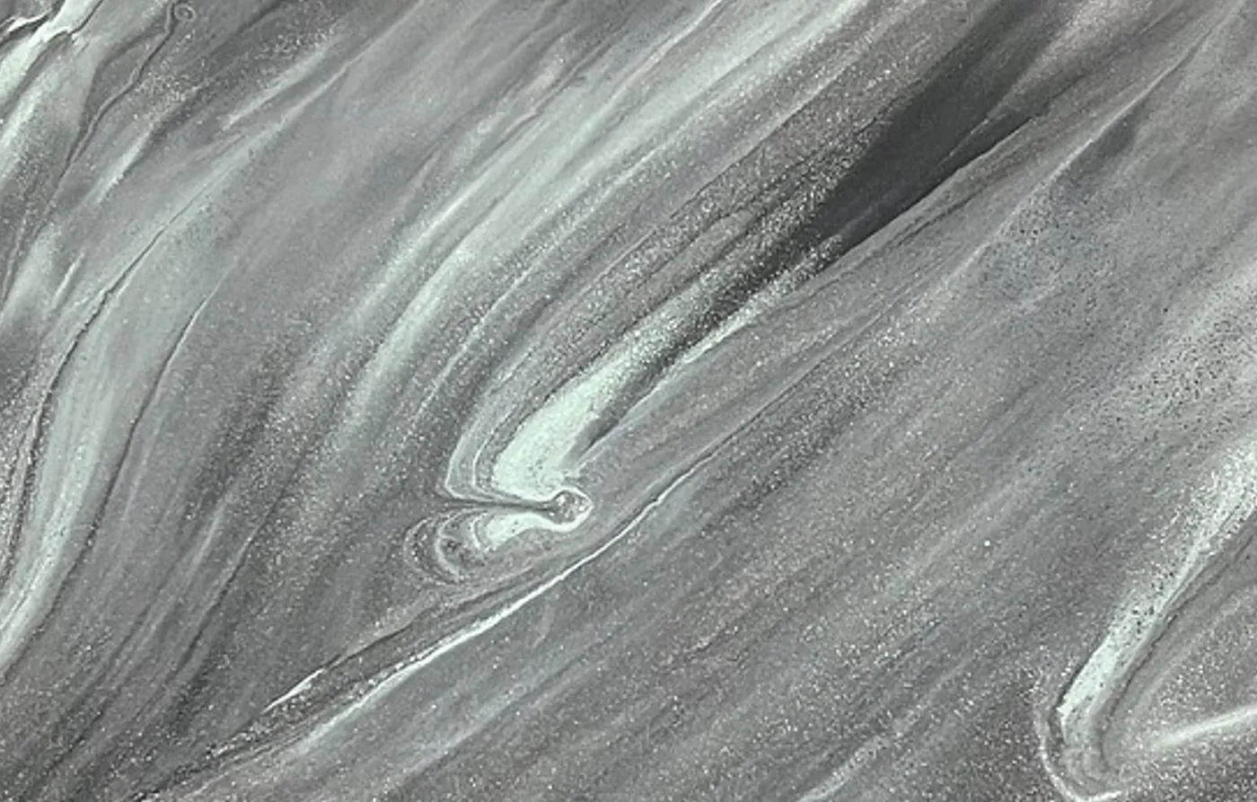 Close-up of silver IFS metallic epoxy with flowing swirls