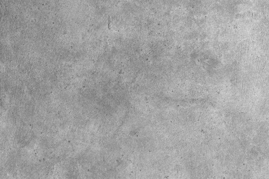 Close-up of the grey surface of an IFS polished concrete overlay