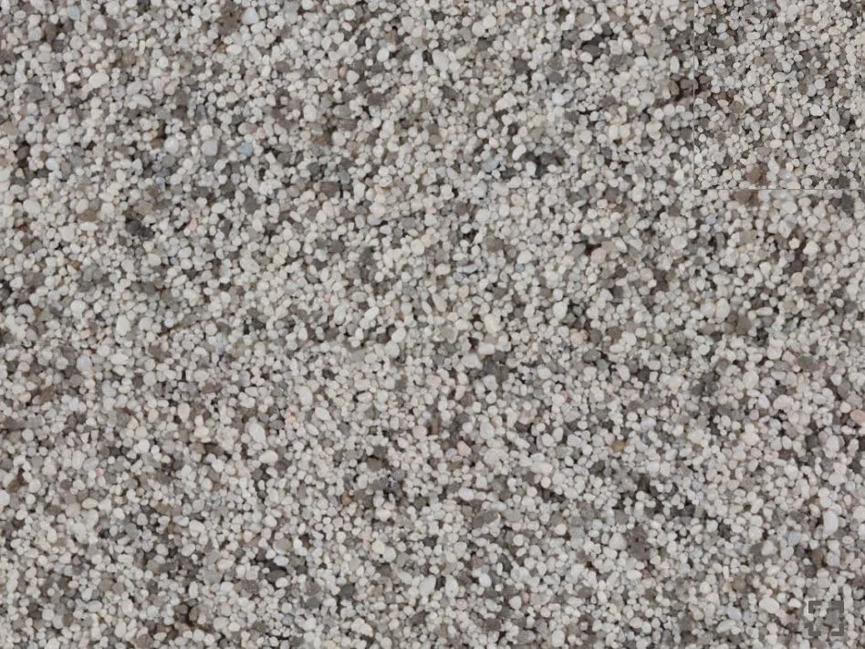 Close-up of IFS stone carpet: light pebbles bound in resin